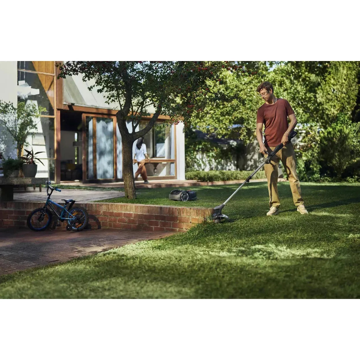 Husqvarna Aspire™ T28-P4A Trimmer med Batteri og Lader